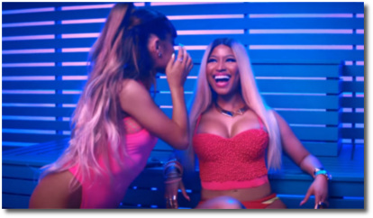 Ariana whispering secrets to Nicki in Side to Side